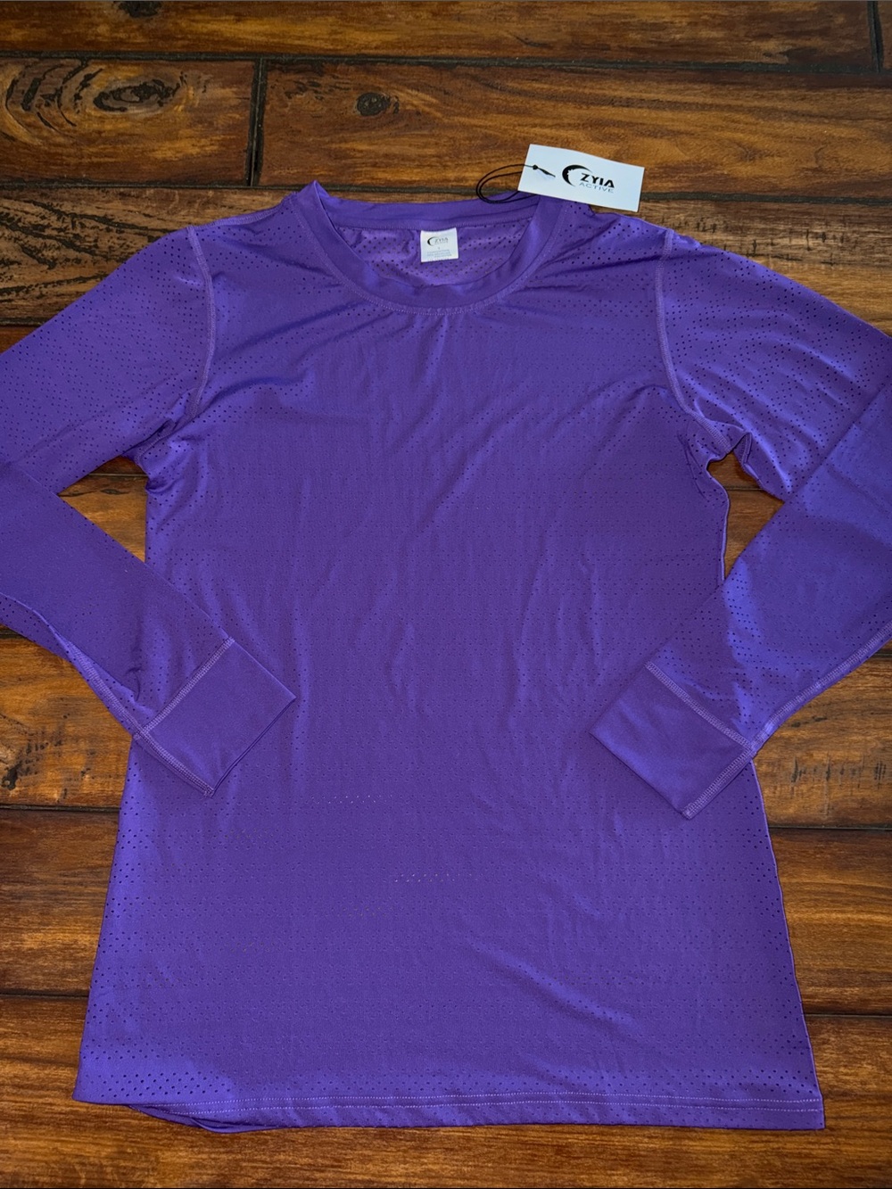 ZYIA NWT Purple Chill Long Sleeve Perforated Crew Top